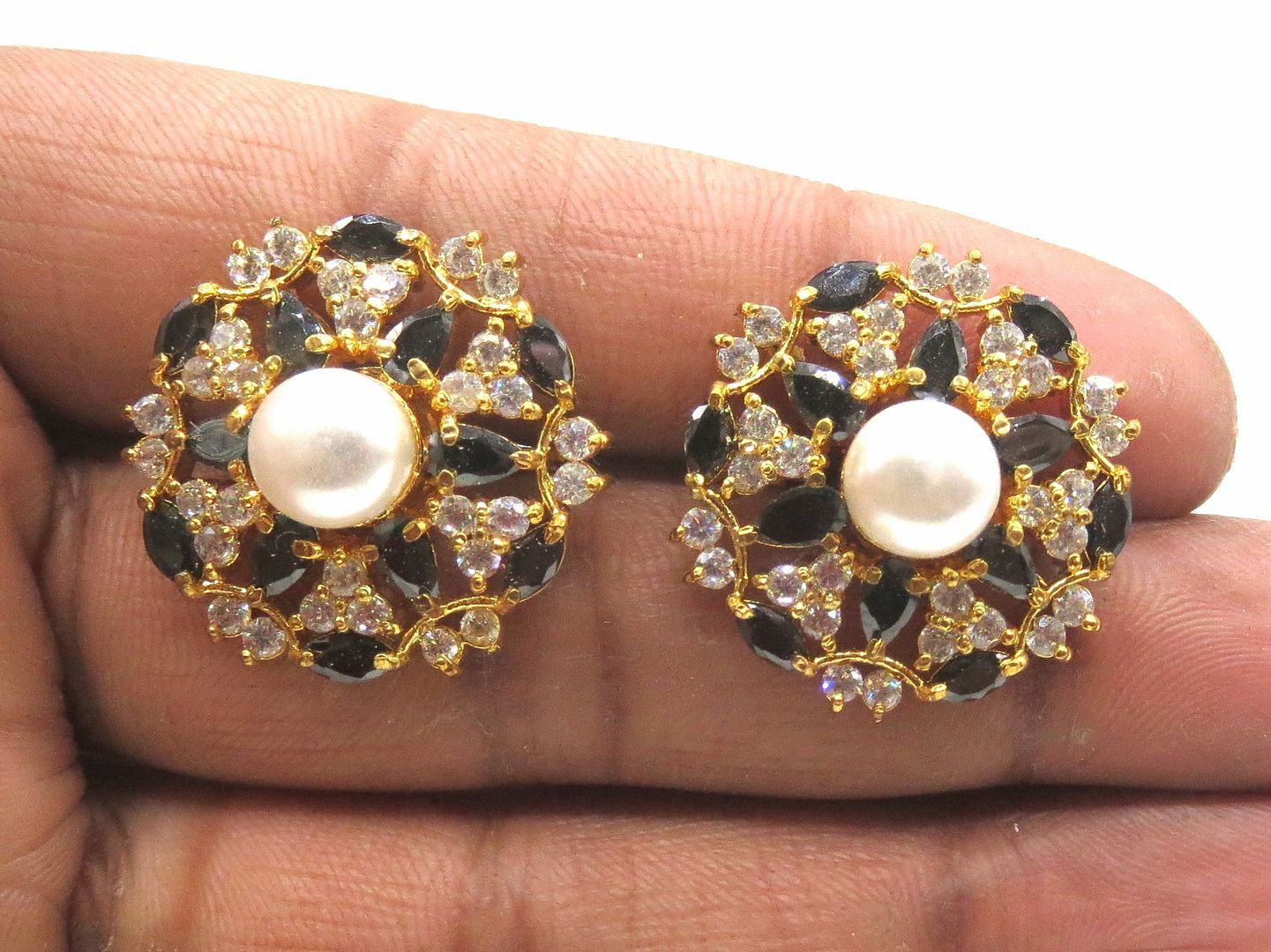 Jewelshingar Jewellery American Diamond PlatedGold Colour Stud Earrings For Women ( 55471GJT )