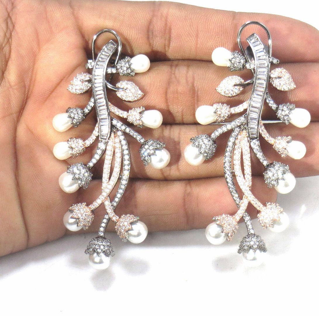 Jewelshingar Jewellery Rosegold Plated Diamond Earring For Women ( 62143EAD )