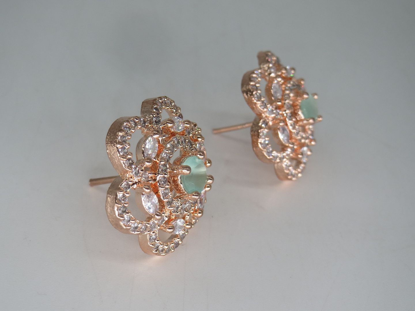 Jewelshingar Jewellery RoseGold Plated Diamond Earrings For Women ( 62566GJT )