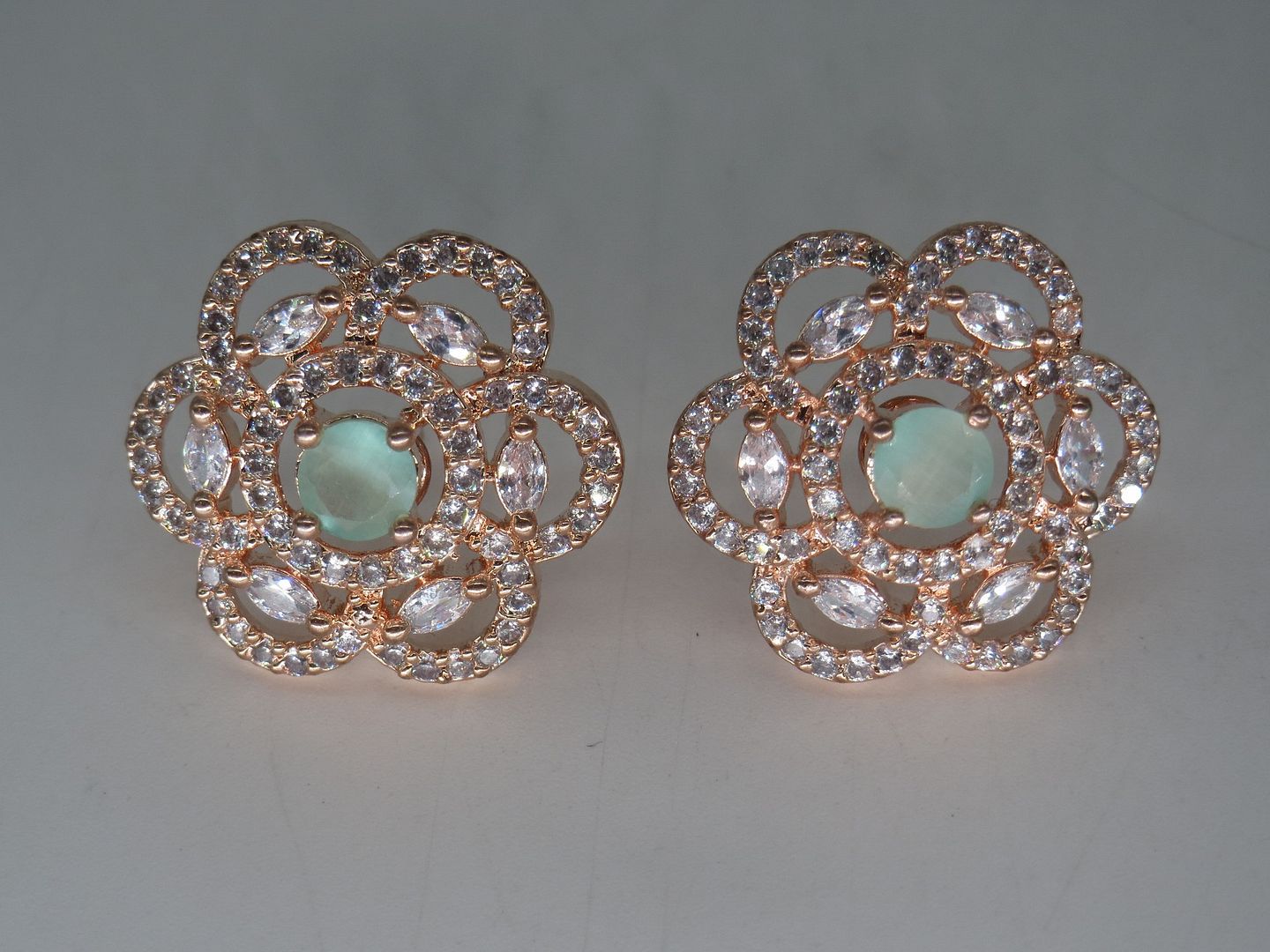 Jewelshingar Jewellery RoseGold Plated Diamond Earrings For Women ( 62566GJT )