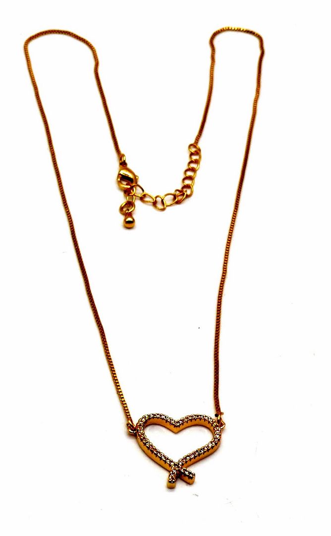 Jewelshingar Jewellery Rosegold Plated Diamond Looking Pendant with Golden Tanmaniya chain For Women ( 92147MST )