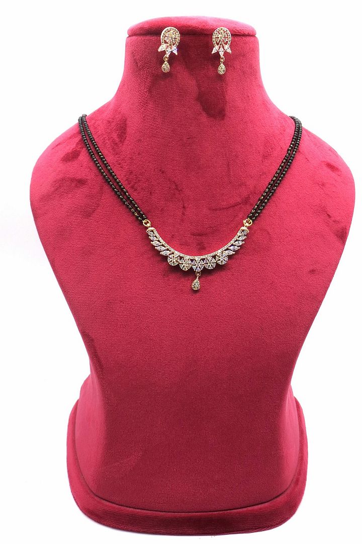 Jewelshingar Jewellery Rosegold Plated Diamond Looking Mangalsutra Pendant With Chain And Earrings For Women ( 92182MSE )