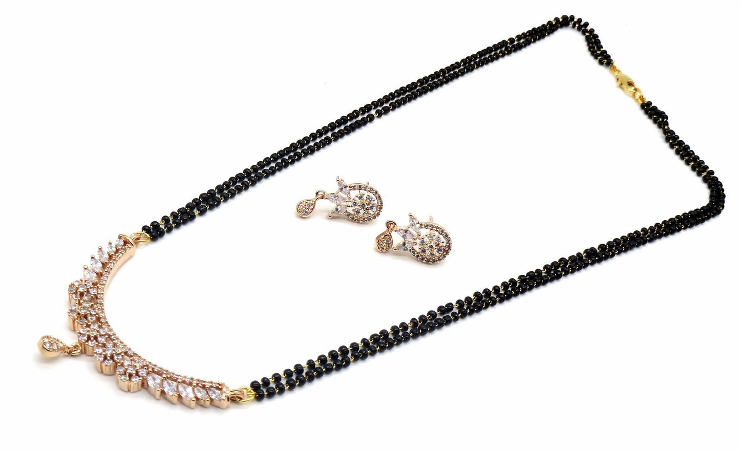 Jewelshingar Jewellery Rosegold Plated Diamond Looking Mangalsutra Pendant With Chain And Earrings For Women ( 92182MSE )