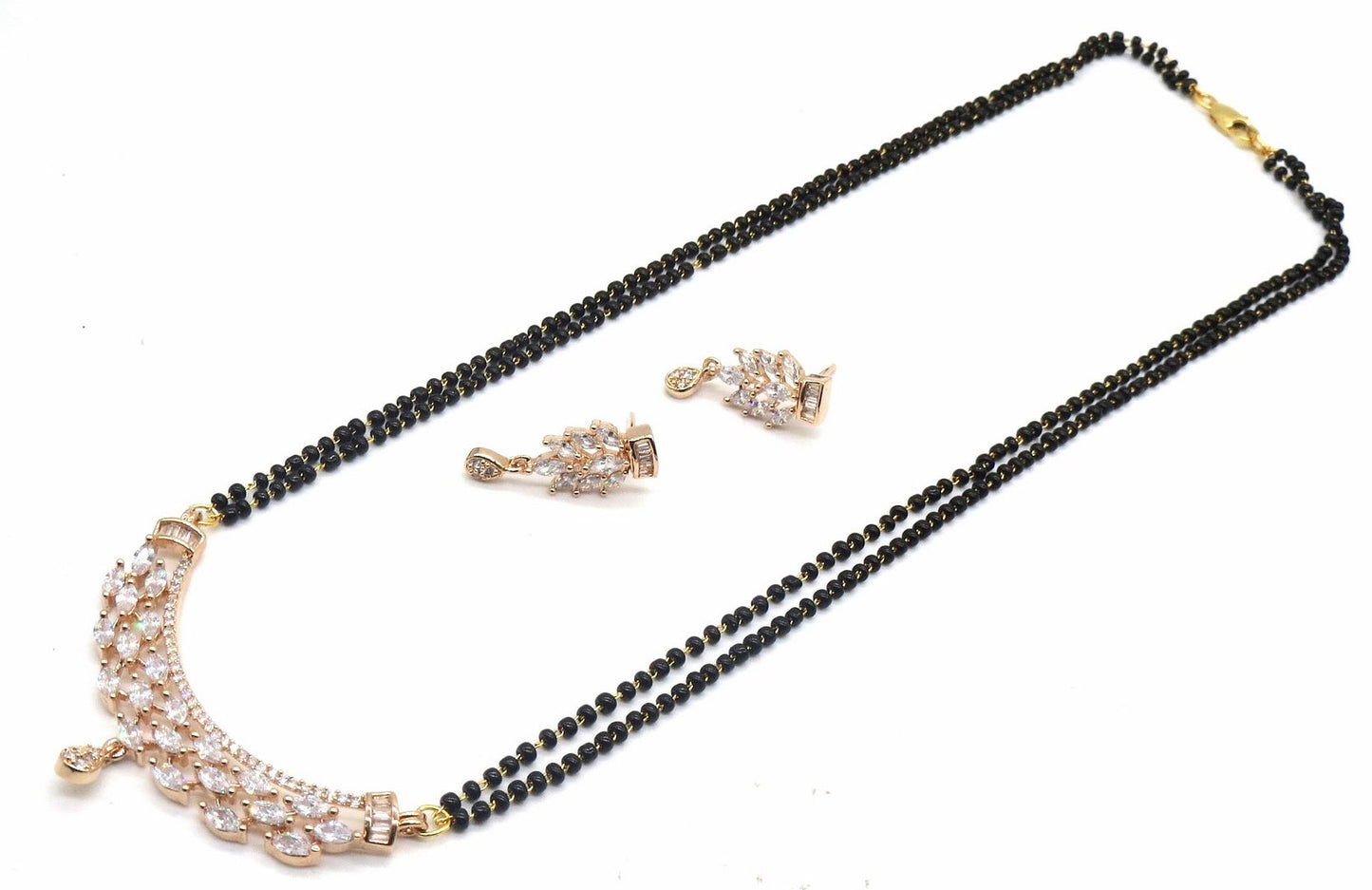 Jewelshingar Jewellery Rosegold Plated Diamond Looking Mangalsutra Pendant With Chain And Earrings For Women ( 92186MSE )
