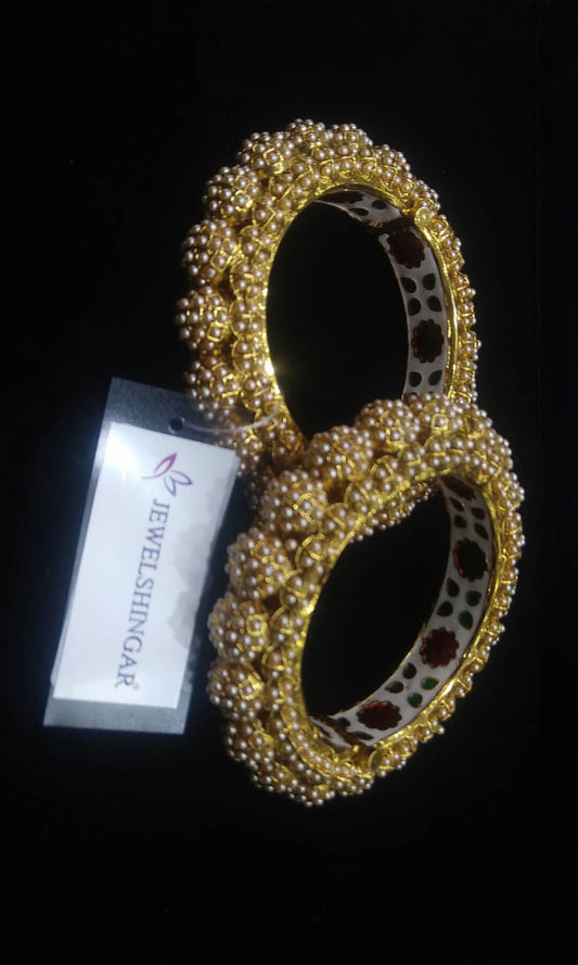 Jewelshingar screw open pearls kada bangles ( 98765-m-p )
