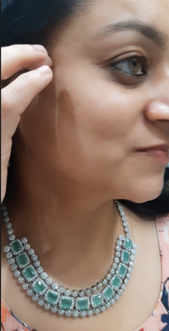 Jewelshingar light green color necklace set in diamond look (93743NAD)